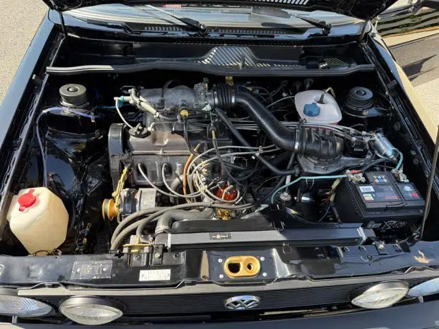 Porsche 911 peinte en bleu métallisé